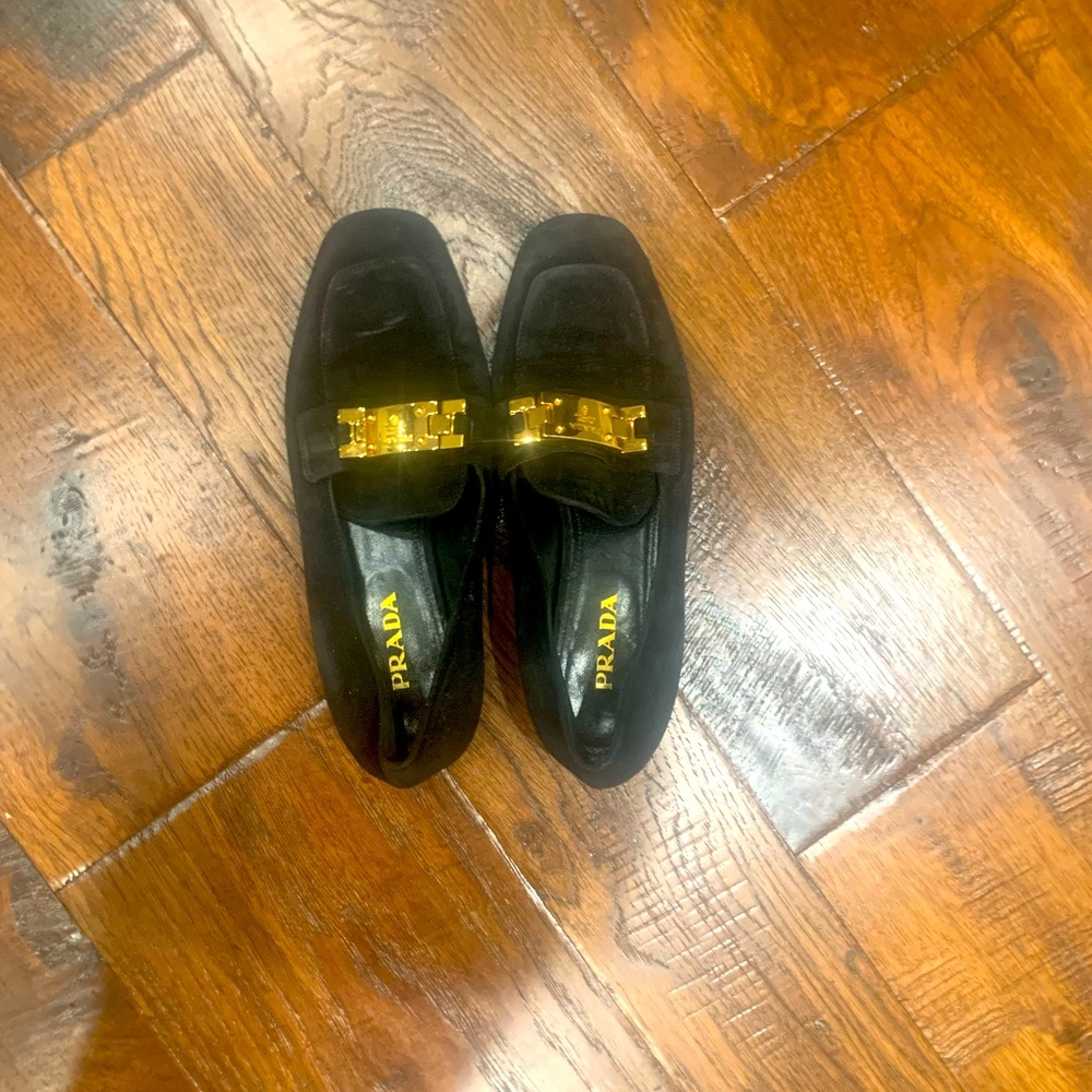 Prada black suede mocassins with gold hardware